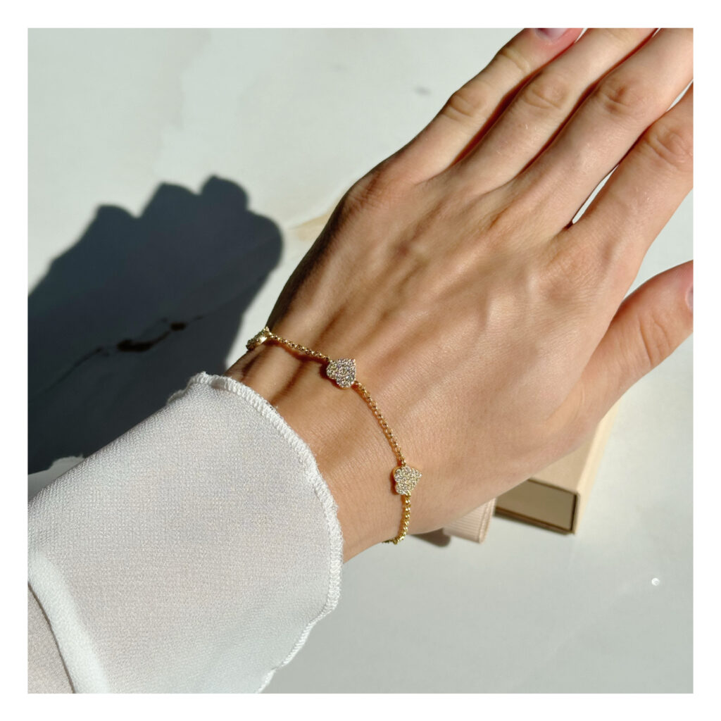 Bransoletka pozłacana z sercami, bogato zdobiona cyrkoniami Rose