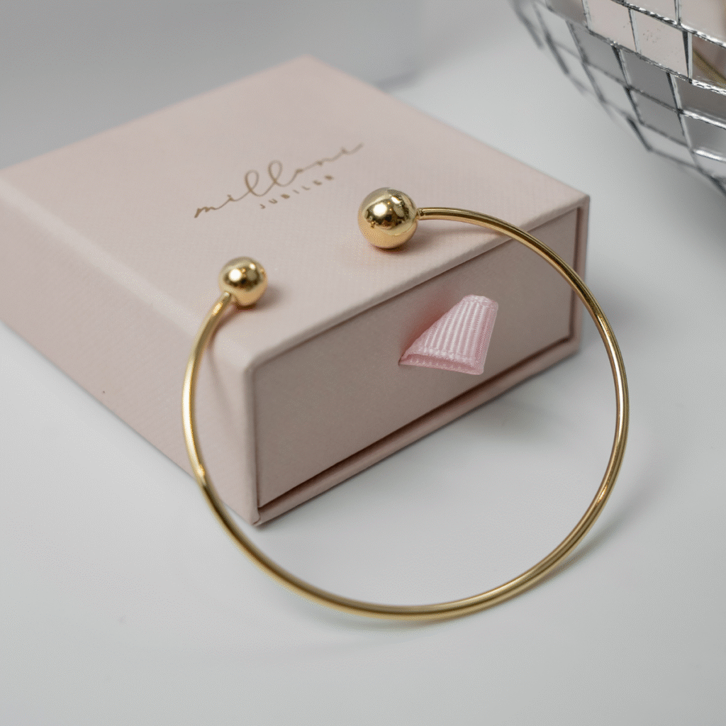 Bransoletka pozłacana sztywna Amara