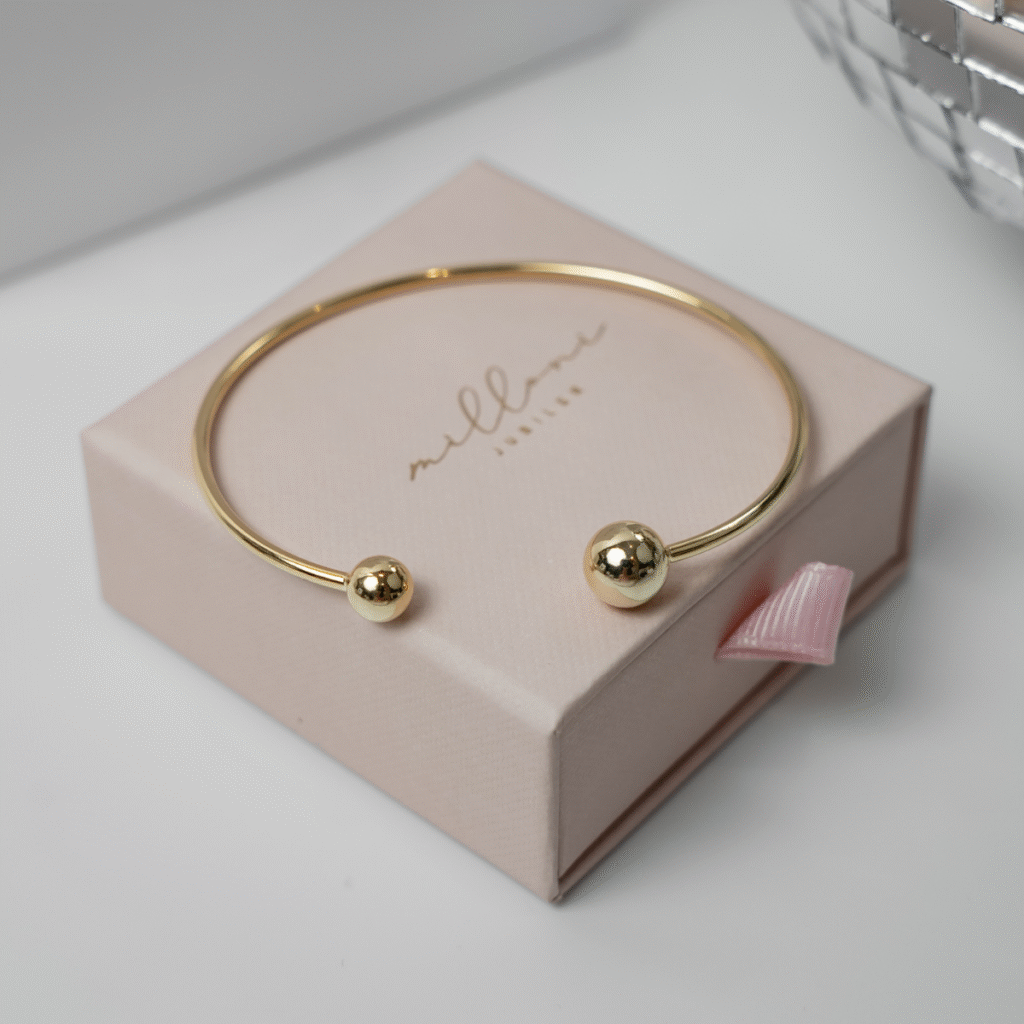 Bransoletka pozłacana sztywna Amara