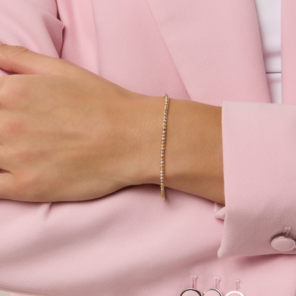 Bransoletka pozłacana z grawerowanymi kuleczkami Blink Rose