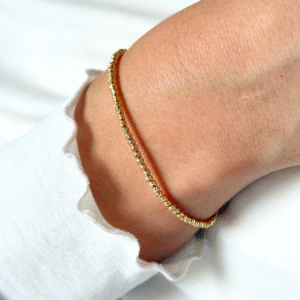 Bransoletka pozłacana z grawerowanymi kuleczkami Blink