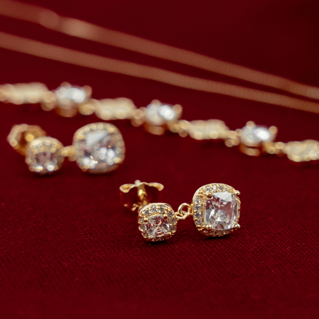 Kolczyki pozłacane na zatyczkę wiszące z cyrkoniami Soleil