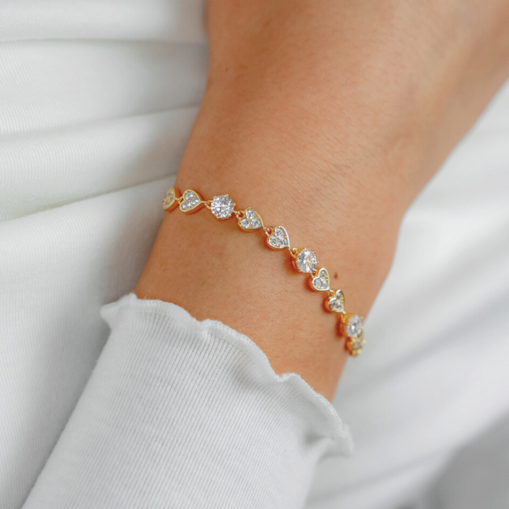 Bransoletka pozłacana z sercami i moissanitami Aura