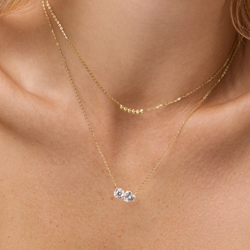 Naszyjnik pozłacany z grawerowanymi kulkami Mirelle